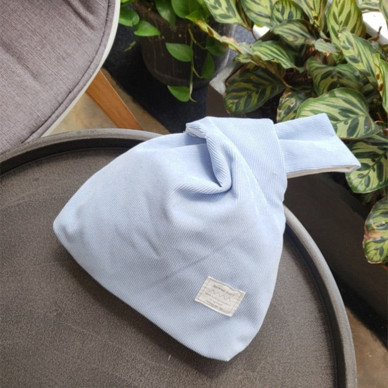 striped corduroy knot bag