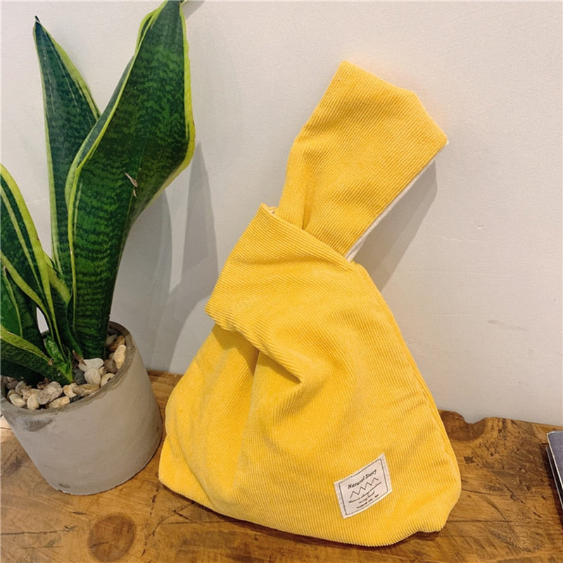 striped corduroy knot bag