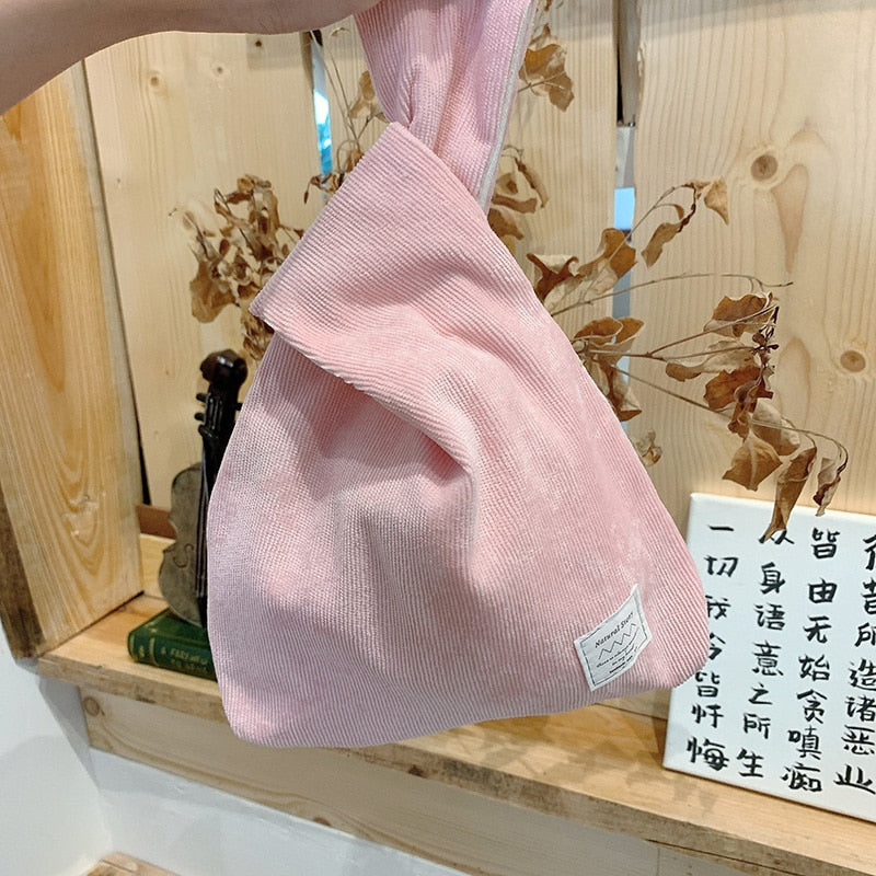 striped corduroy knot bag