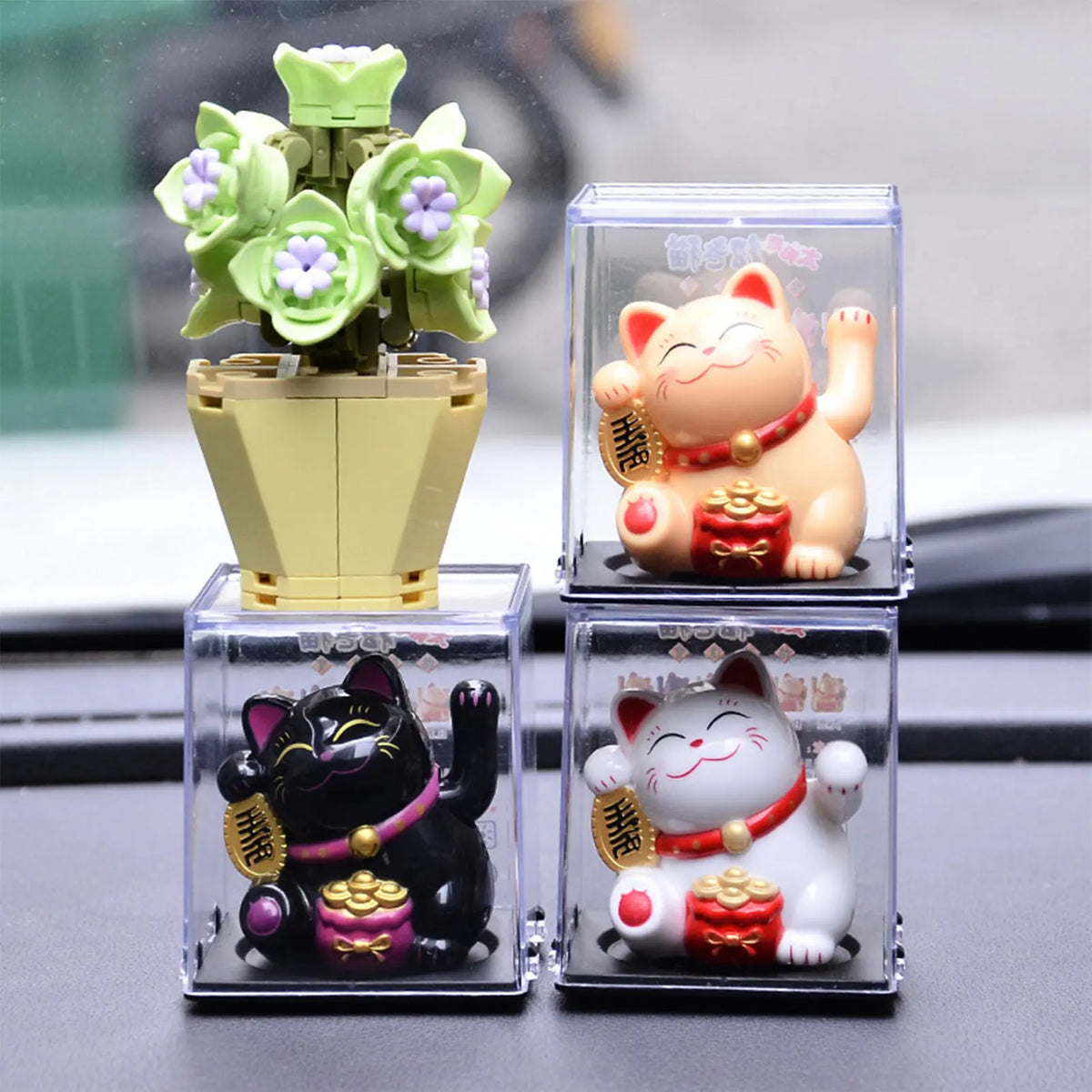 Japanese Lucky Cat Maneki Neko figurine with raised beckoning paw