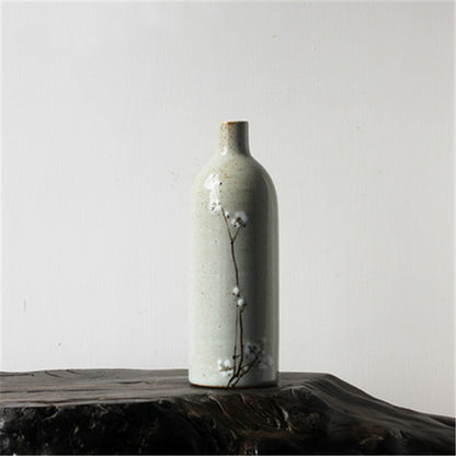 white blossom vase