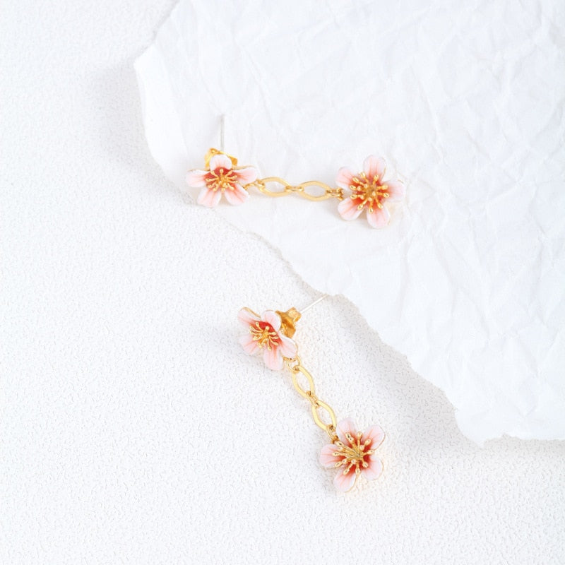 white blossom earrings