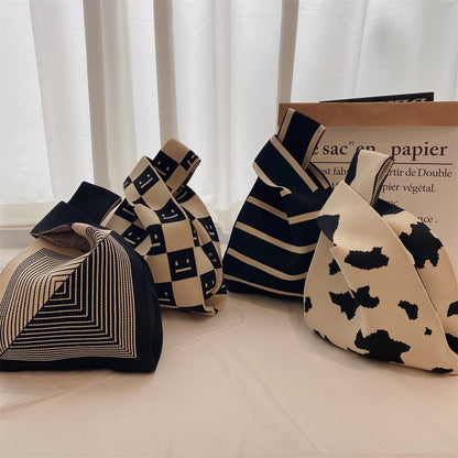 geometric rug knot bag